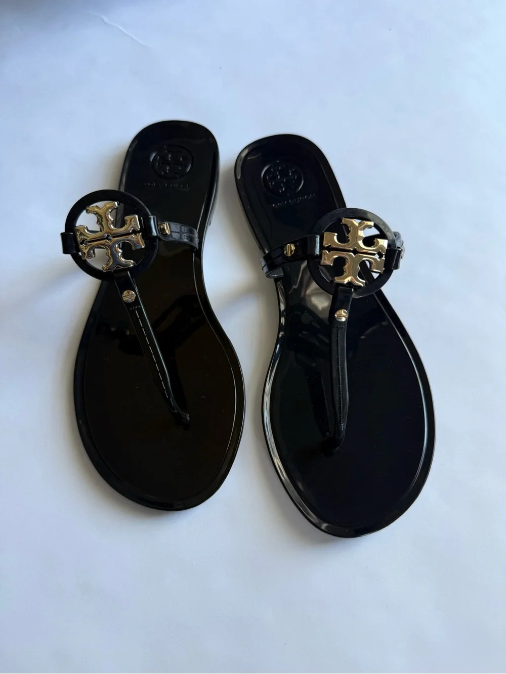 Tory Burch Black Jelly Thong Sandals with Gold Logo Emblem